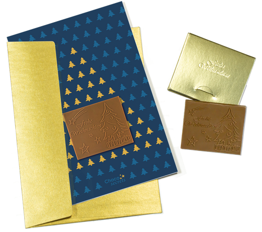 Christmas cards with embossed chocolate in a gold box, set of 5, card design: dark blue sky with Christmas tree, embossed chocolate: "Frohe Weihnachten", envelope in gold