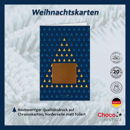 Weihnachtskarten mit Schokoladenprägung in silberner Box, 5er-Set, Kartendesign: dunkelblauer Himmel mit Weihnachtsbaum, Schokoladenprägung: „Frohe Weihnachten“, Umschlag in Silber